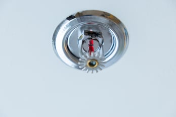 A fire sprinkler that would be required to follow fire sprinkler code requirement in commercial buildings